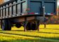 Spring towing safety checklist – heavy‑duty trailer on a Michigan field
